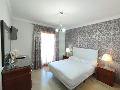 Adosado Centro Urbano 3 Dorm Patio Terraza Wi-fi Puente Genil 1-6 Huésped (Adosado Centro Urbano 3 Dorm Patio Terraza Wi-fi Puente Genil 1-6 Huesped) in 普恩特格尼爾