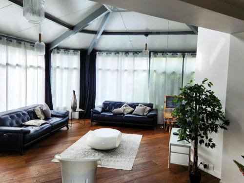 Trinity House - 20 minutes de Paris Saint-Lazare gîte à louer Médan