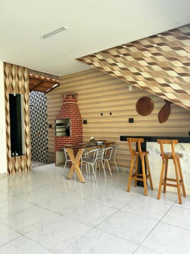 Three-Bedroom House room in Casa por temporada