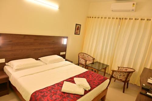 Poorva Residency in ฮัสสัน