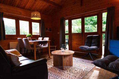  Sfeervol houten huisje met fijne buitenruimte op de Veluwe in Epe