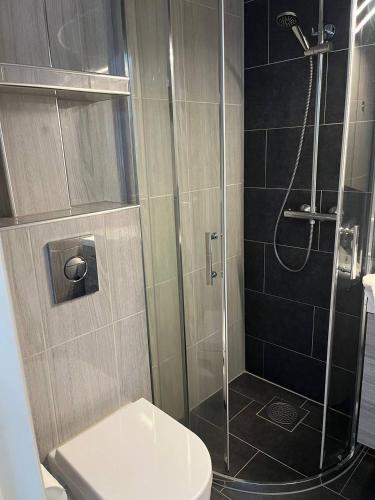 Душ, Tønsberg Sentrum in Тронсберг