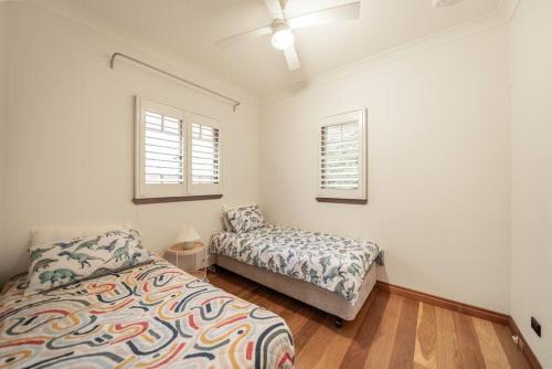 House of Fairy Wren -Charming Queenslander Cottage mins drive to Brisbane CBD and Gabba Stadium!