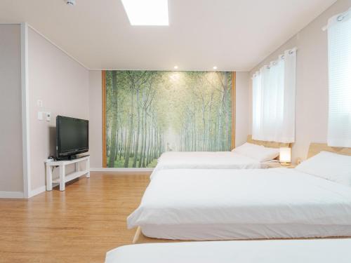 อินชอน แอร์พอร์ต เกสต์เฮาส์ เรนบูทส์ (Incheon Airport  Guesthouse Rainboots ) in อินชอน