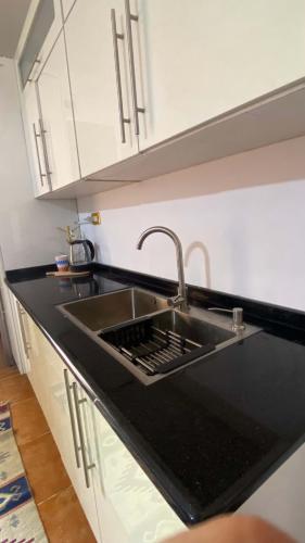 Cocina, SeaStar Sea View apartment 10 minutes away from beach in Sowayma