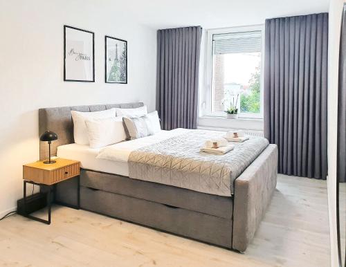 LIVATION - Apartments Hamm-Mitte - 2 Zi - Nespresso - SmartTV - freeWiFi - ausgestattete Küche - 24h Check-In - bis 4 Pers pro Apartment in Hamm, Deutschland