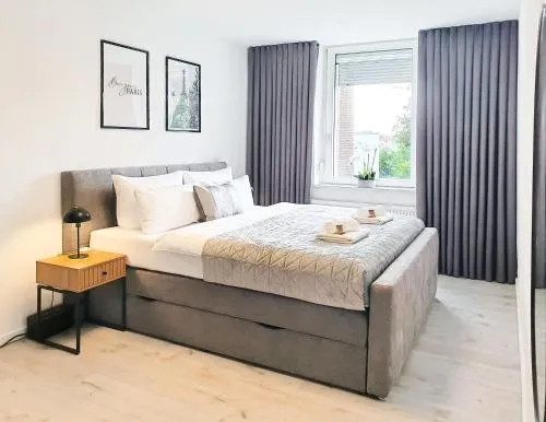LIVATION - Apartments Hamm-Mitte - 2 Zi - Nespresso - SmartTV - freeWiFi - ausgestattete Küche - 24h Check-In - bis 4 Pers pro Apartment in Hamm, Deutschland