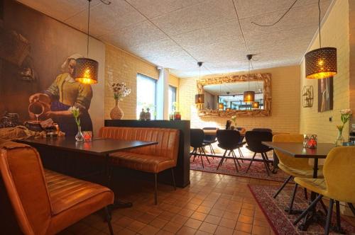 ห้องอาหาร, Vakantiehuis Lochem in เฟอร์สไพรเดอ เฮาเชน เฮต เฟน เอน โกรเทอ เฟลด์