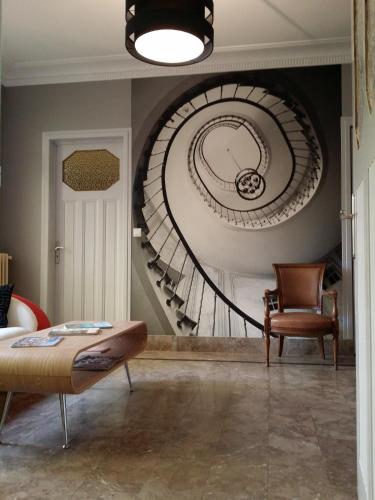 Közös társalgó / TV, Le Castel Guesthouse in Bayeux Városközpont