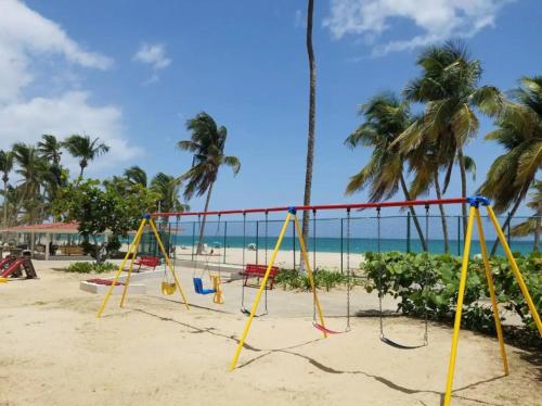 Beachfront 1BR Apt in Marbella del Caribe Isla Verde - image 11