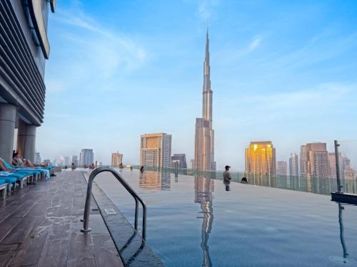 3 King Beds - 7mins to Dubai Mall - High Floor Sun Set and Sea View, Dubai (photo 10)