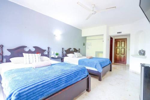 Spacious Room with Two Double Beds in Playa del Carmen, Mexico