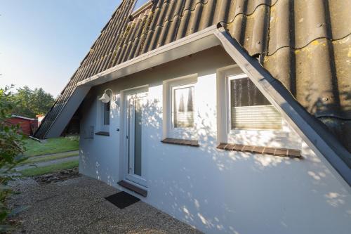 Ferienhaus "Strandidyll" Opi Huck Stroot 01 in Dorum Neufeld, Deutschland