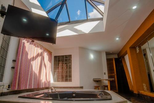 Shared lounge/TV area, Hotel Espor CA in Barinas