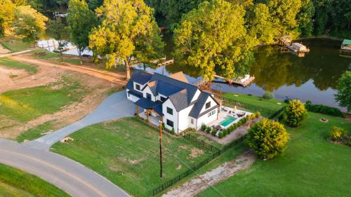Lakefront Retreat with Dock and Pool