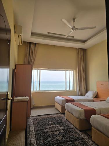 Leading Wings Beach Apartments in Sur