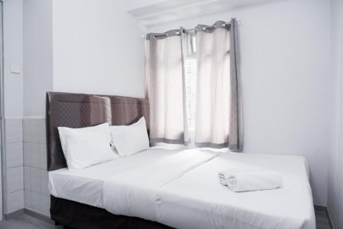 Nice and Simply 2BR at Green Bay Pluit Apartment By Travelio, Yakarta