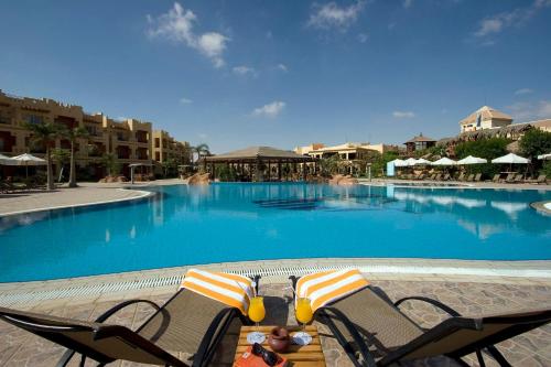 Swimming pool, Swiss Inn Pyramids Golf Resort in 6th October