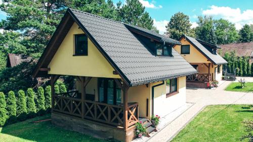 Domki Spokojny Zakątek z balią z jacuzzi