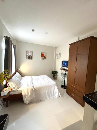 Henry residences Apartment Studio type close to SM, Walking St, Airport, Guagua