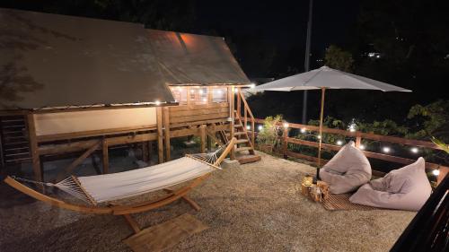 Twiga tenda su palafitta in Porto Maurizio