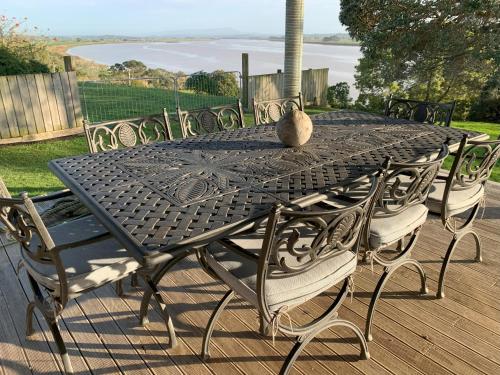 Large riverfront home with spa and stage in Te Kopuru