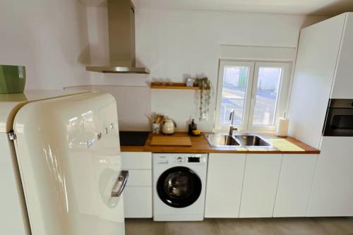 Casa Dezigual - Amieira