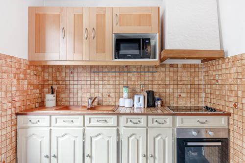 Konyha, Logement 2 pièces 36m2, CDG Airport, Disneyland Paris, Asterix, Parc des expo, 10min gars de Chelles (Appartement 2 pieces 36m2, CDG Airport, Disneyland Paris, Asterix, Parc des expo, 10min gare de Chel) in Villevaude (Ile-de-France)