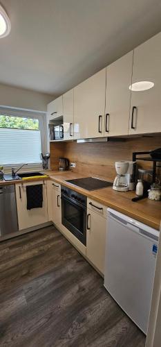 ห้องครัว, Ferienhaus "Dat Löppt" Bad Bramstedt (Ferienhaus "Dat Loppt" Bad Bramstedt) in บัด บรัมชเตดท์