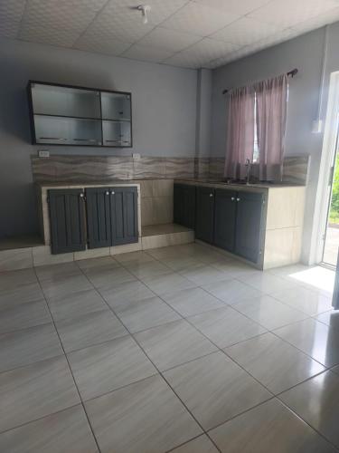 Kitchen, Cozy Retreat in Piarco
