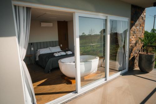Pezsgőfürdő, Casa 2 suítes, ofurô, piscina no Vale dos Vinhedos (Casa 2 suites, ofuro, piscina no Vale dos Vinhedos) in Monte Belo Do Sul