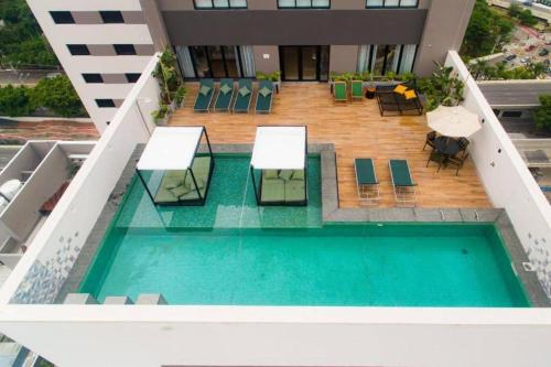 Vila Olímpia Studio Good Local Piscina Coworking Rooftop Cinema Gym CAMA QUEEN e SOFÁ CAMA QUEEN confortáveis e grandes, São Paulo