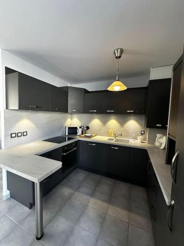 virtuve, Bois joli - Maison classée 3 étoiles, à 2 pas de la plage (Bois joli - Maison classee 3 etoiles, a 2 pas de la plage) in Langrune-Sur-Mer