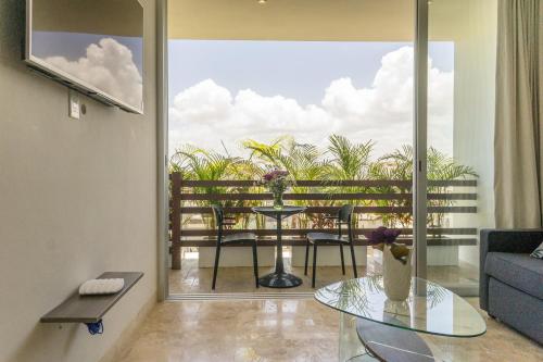 Tropic Playa Apartments - Tap to explore photos
