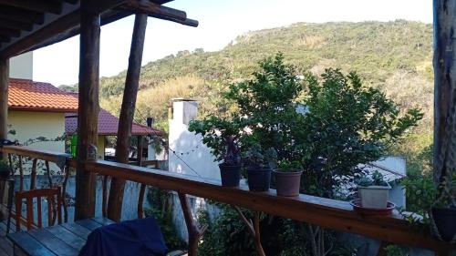Kilátás, Quarto com banho privado e lavanderia in Joaquina Beach