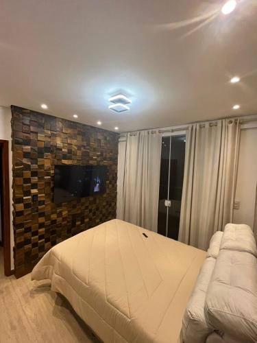 Apartamento com vista para piscina com hidromassagem e aquecedor in Cataguases