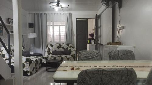 Shared lounge/TV area, RD Homestay in Sablan in Irisan