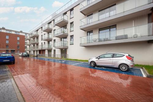 Vista Exterior, Spacious 2-bedroom Apartments by Noclegi Renters in Welnowiec