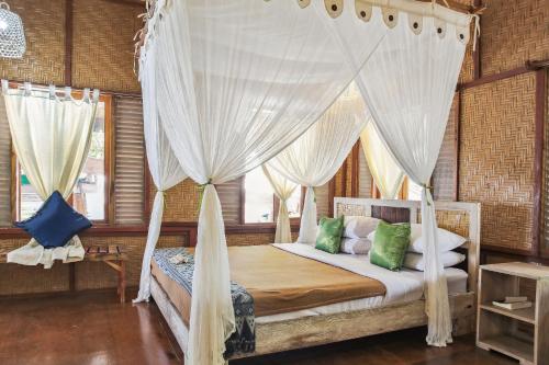 Cemara Beachfront Suite - Tap to explore photos