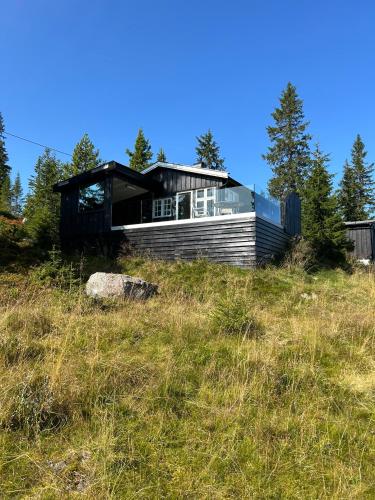 Sjusjøstua by Norgesbooking - cabin close to cross country trails – khách sạn tại Sjusjoen
