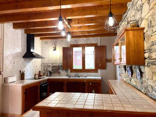 virtuve, Casa Martinach - L'Amfitriona in Sant Martí de Canals
