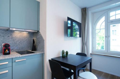 Kitchen, HITrental Riesbach Apartments in Ruschlikon