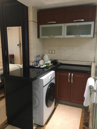 Kitchen, Pullman International Apartment Guangzhou Gangding Subway Station Taikoo Hui Branch in Guangzhou