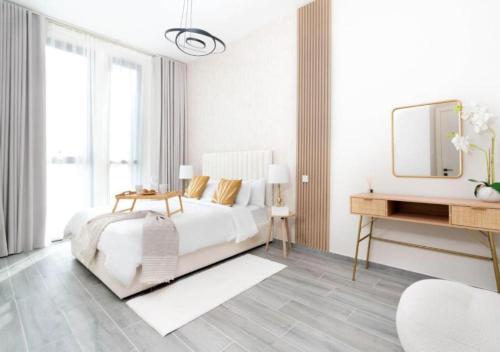 Cozy 2BR Near Dubai Spots Midtown Dubai Access by Vibel, Dubaj (fotografie 2)