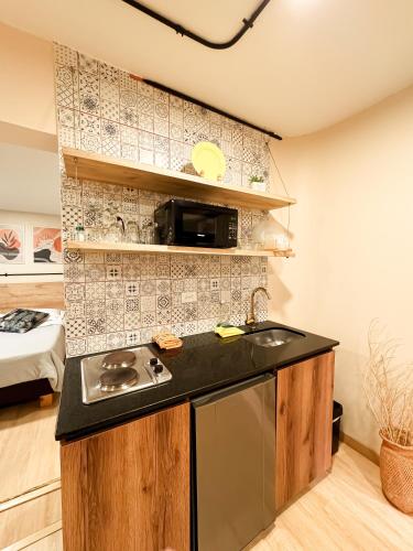 Nuevo estudio cerca de Plaza Mayor NID101 By Roots Rentals, Medellín (fotografie 9)