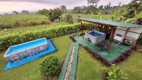 Arenal Nephelium Country Home, Refugio rural con piscina, jacuzzi y balcón con hermosas vistas al Volcán Arenal, en una finca privada, Fortuna (foto 8)