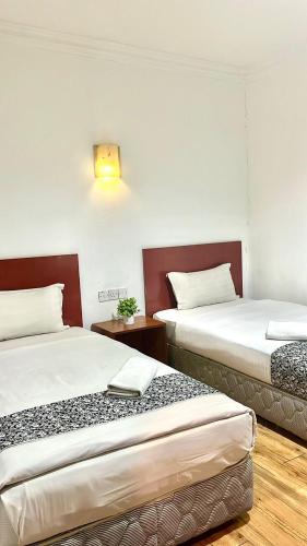 Foto - Switz Paradise Hotel - 5 minute walk to Centre Point and 10 minute walk to waterfront-