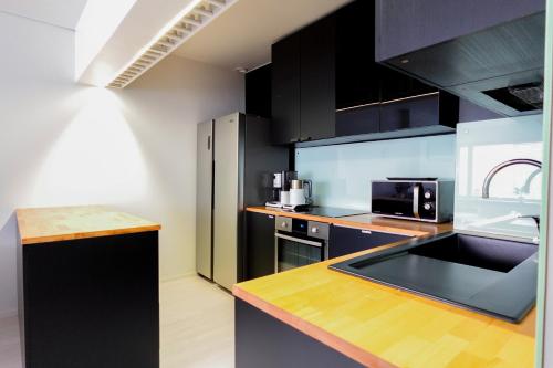 GuestFirst- Vibrant Helsinki Stay 5 Min to Design District, Helsinki (foto 5)