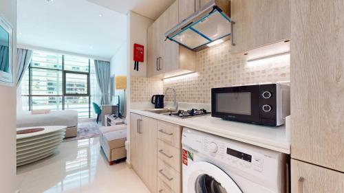 Vacationer Holiday Homes I Chic Studio I Palm Jumeirah I Close to West Beach l Palm Jumeirah, Dubái (foto 3)