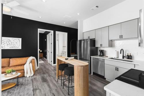 Chic Music Row Condo Rooftop Deck with City View Gym Office and More